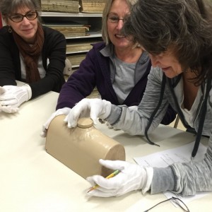 Teachers practice artifact interpretation at the Chilliwack Museum and Archives.