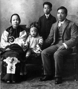 Business owners Wong Gip She (right) and Wong Gip Low She (left) with their two sons Banford and David, c. 1916. CMA P7642