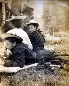 Gertrude and Irene Knight rest at Prairie Camp, halfway up the Lhílheqey hike, 1907 [P1192]